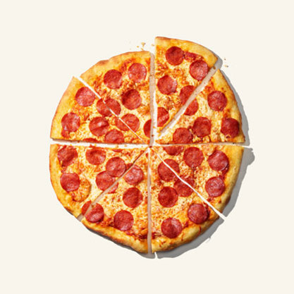 Sliced pepperoni pizza with a golden crust and evenly baked cheese.